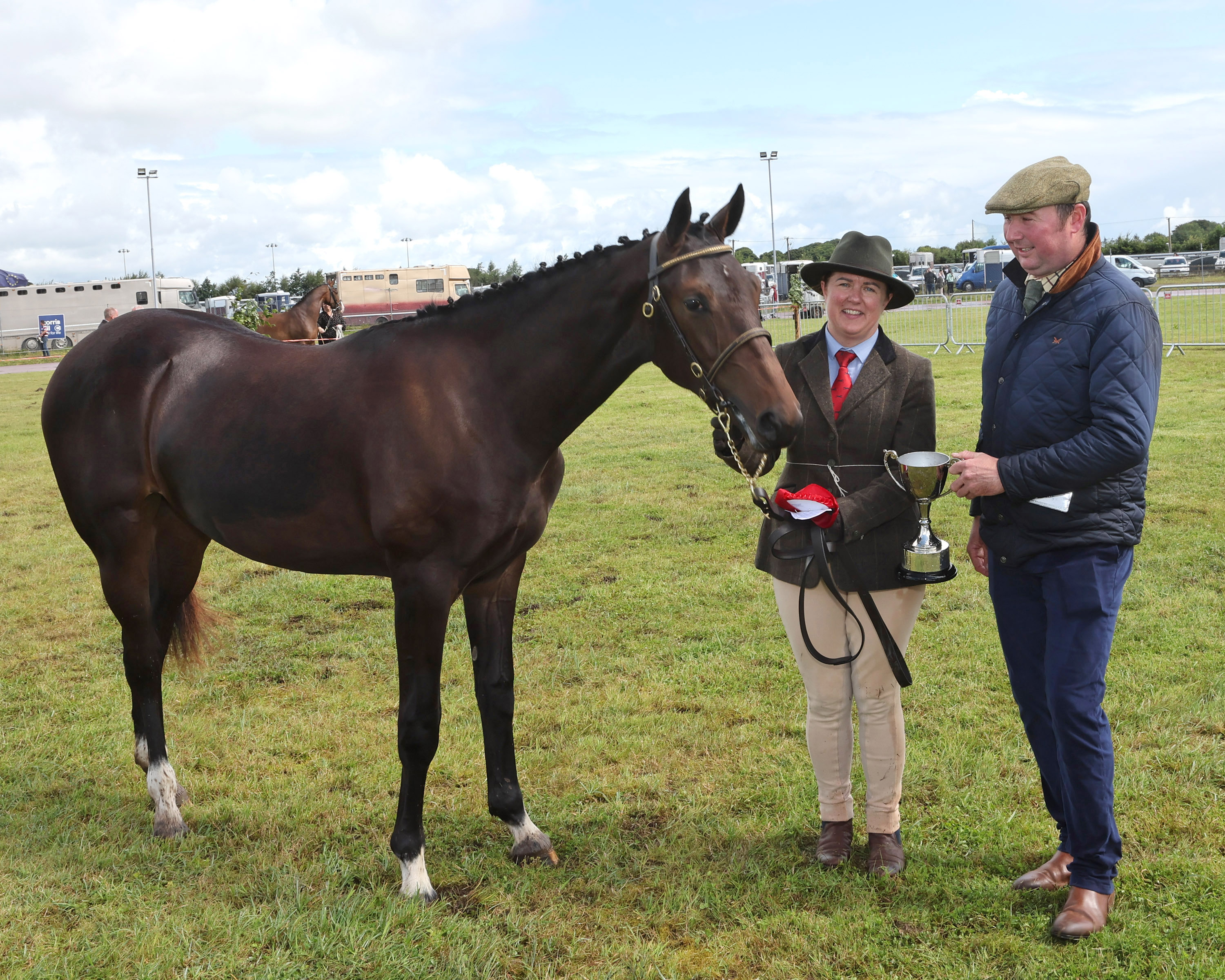 Glenn Farrell Walker (Judge) presents the John McGuinness Memorial Cup for Yearling Colt Gelding or Filly to Elaine Gardiner, Knockadine Crossmolina at the Claremorris 103rd Show in the Showgrounds Claremorris. Photo © Michael Donnelly