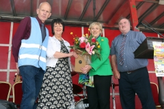 Maureen Finnerty secretary Claremorris Agricultural Show makes a presentation to Minister for Social Protection and Rural & Community Development Heather Humphreys TD  who performed the official opening of the Claremorris 103rd Show in Claremorris on 5th August, included are Michael McGrath Show Treasurer Tom Connolly, Show Chairman. Photo © Michael Donnelly