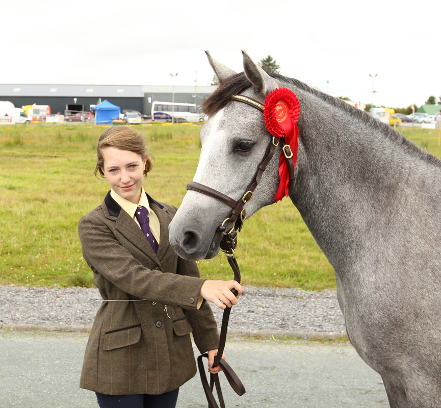 Rachel Byrne, Knocknagur Tuam pictured with her Connemara Yearling Filly, winner of the Fr Tuffy Cup at the 94th Claremoris Agricultural Show. Photo: © Michael Donnelly Photography