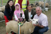 Michael Murphy Moneen, Cummer, Tuam (on right) is presented with the Walter Brennan  Perpetual trophy for Overall Champion Sheep at the 88th Claremorris Agricultural Show, included in photo from left: Michelle Murphy, Laura Murphy, John McWalter, Sheep Steward (at back), and Patsy Reilly (Sheep Judge). Photo: © Michael Donnelly